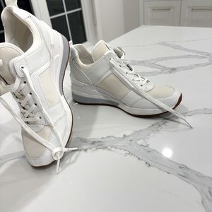 Michael Kors cream and white wedged sneakers